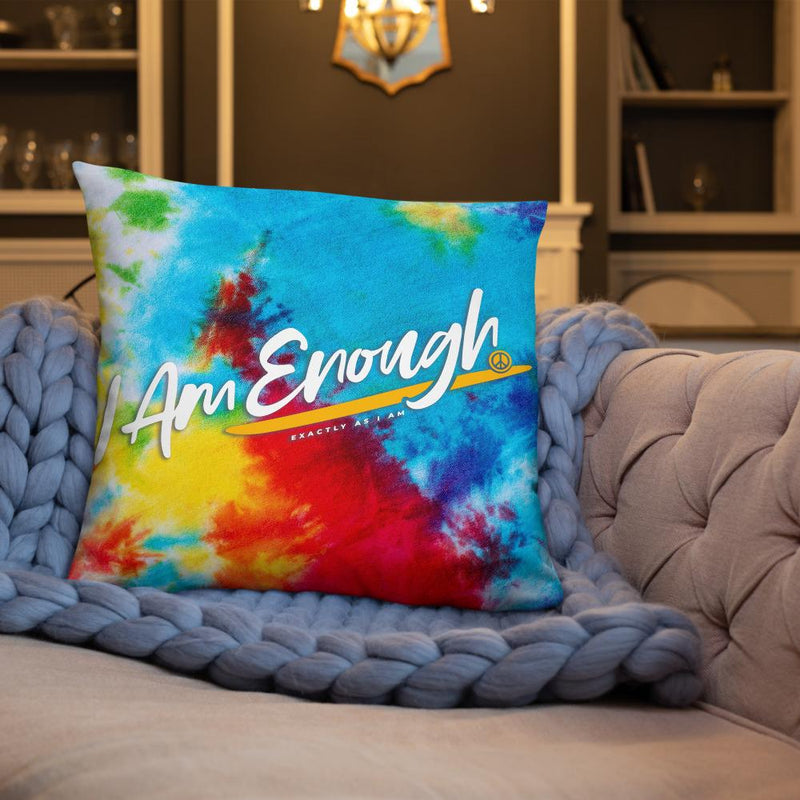 I AM ENOUGH TIE DYE PILLOW on a tan sofa with blue blanket