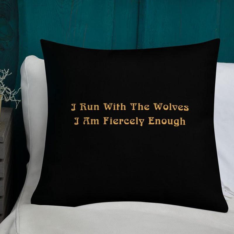 Back of a black STRONG WOLF PILLOW - It says "I run with the wolves, I am fiercely enough."